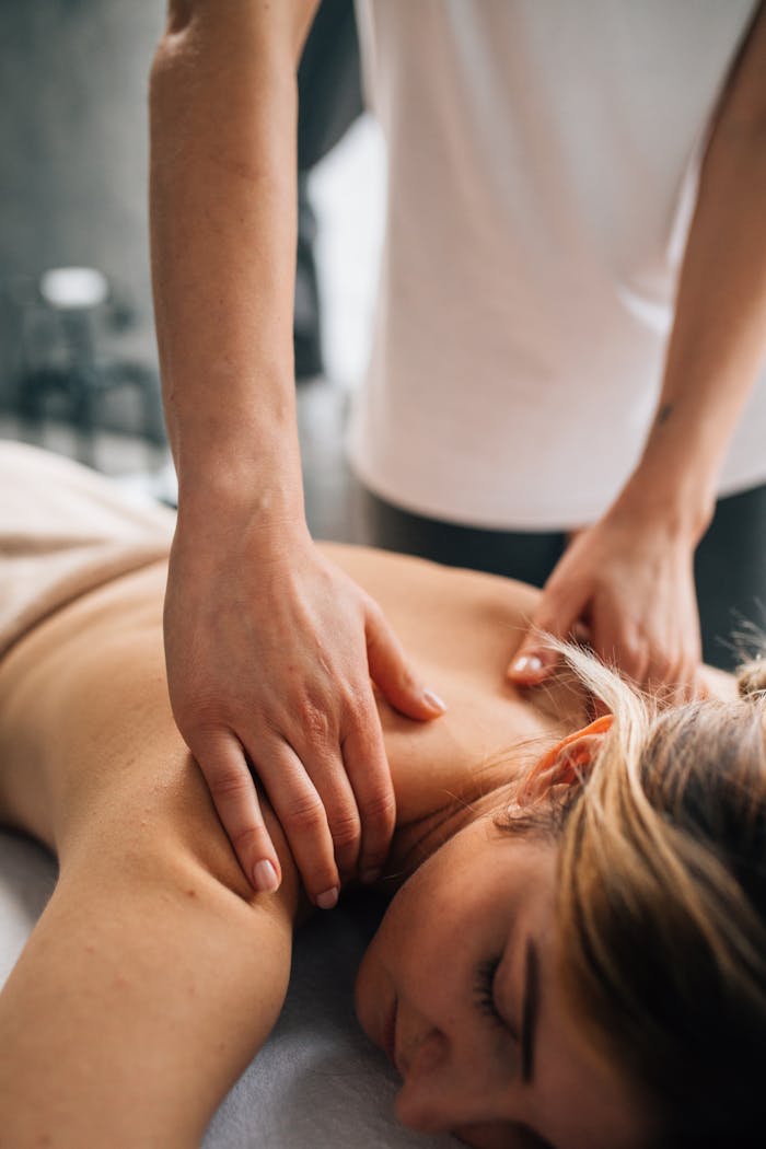 A soothing massage therapy session indoors, promoting relaxation and self-care.